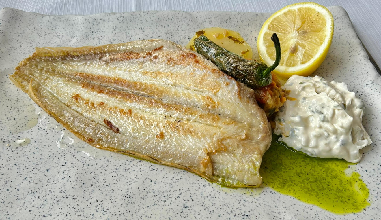 🐟 Grilled fish Caught locally, grilled whole or filleted, served with nothing more than lemon and good olive oil. The purest expression of Mediterranean cooking.